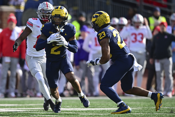 NFL Destinations for Michigan’s Star Quarterback and Running Back Prospects
