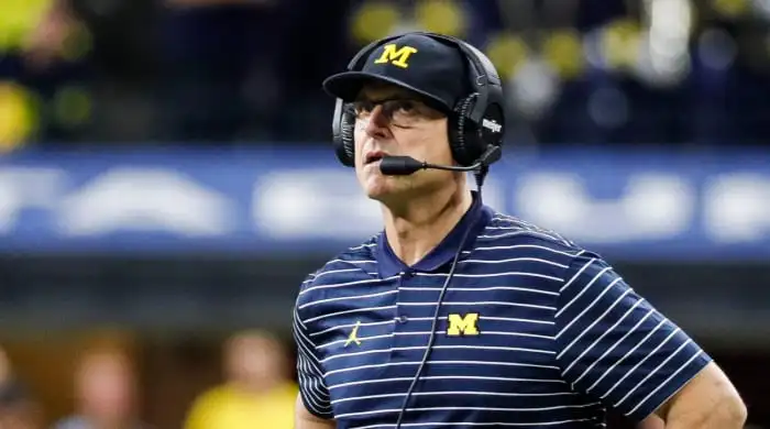 Michigan’s Jim was threatened with suspension by NCAA last fall for lawyer’s social media criticism